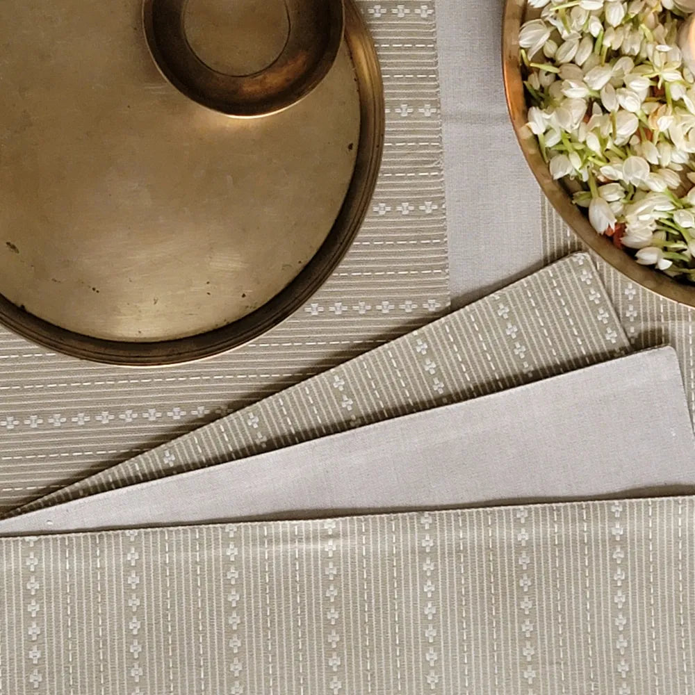 Woven Desert Sand Placemats by The Yard House in beige, set of 4 round scalloped design, perfect for minimalist dining.