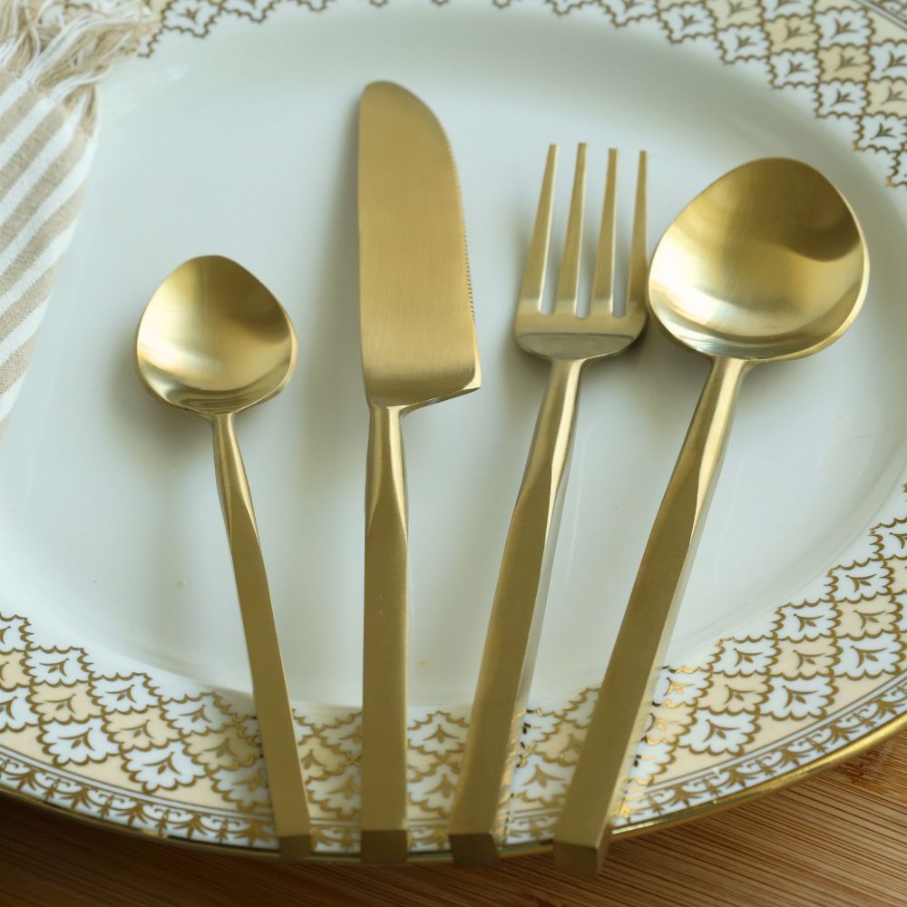 Matte gold knife, fork, tablespoon, and teaspoon with squared handles