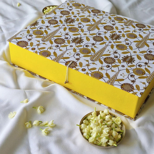 Large hamper gift box with patterned lid and yellow side panels, open view