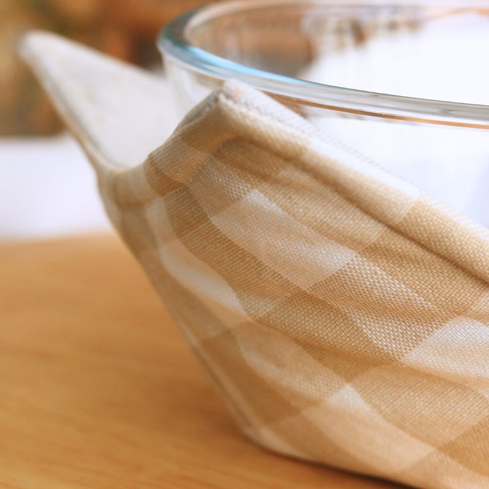 Beige and white check reversible pot holder fabric with stitched edge detail