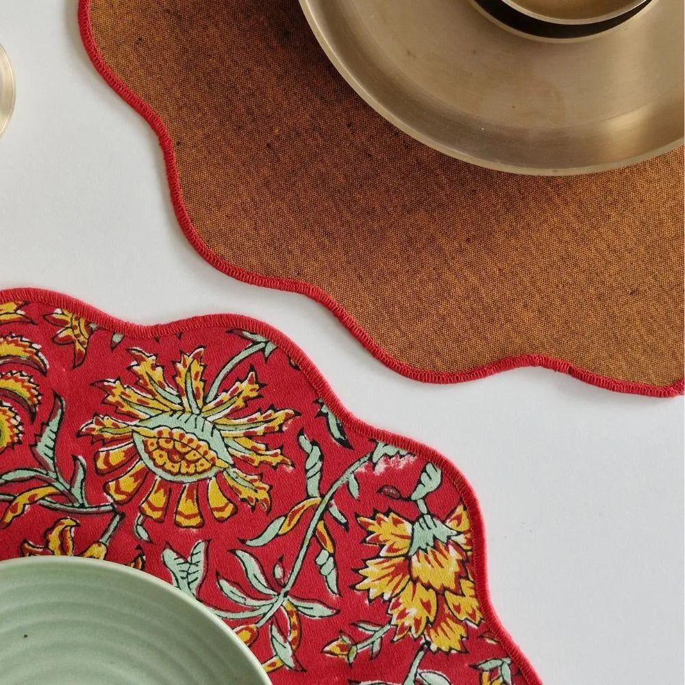 Acres Wild Placemats by The Yard House in bold red, featuring floral designs. Available in rectangle (12" x 17") and round...