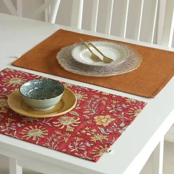 Acres Wild Placemats by The Yard House in vibrant red, featuring floral designs; available in rectangular (12" x 17") and ...