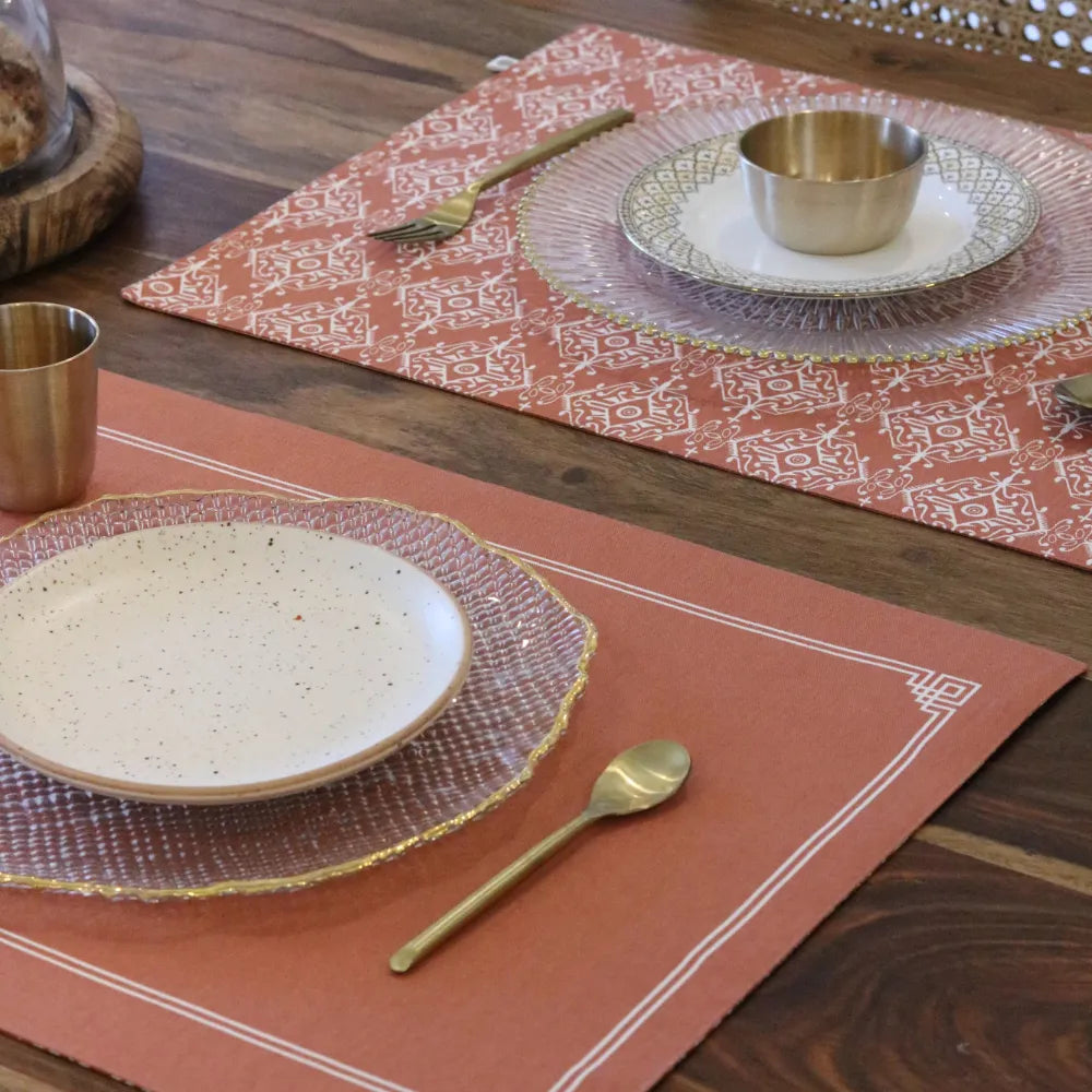 Agra Red Placemats by The Yard House in terracotta pink, set of 4, featuring bold geometric patterns and traditional India...