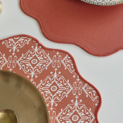 Agra Red Placemats by The Yard House in terracotta pink, set of 4, featuring bold geometric patterns and traditional India...