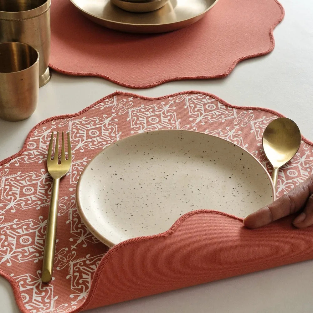Agra Red Placemats by The Yard House in terracotta pink, set of 4, featuring bold geometric patterns and traditional India...
