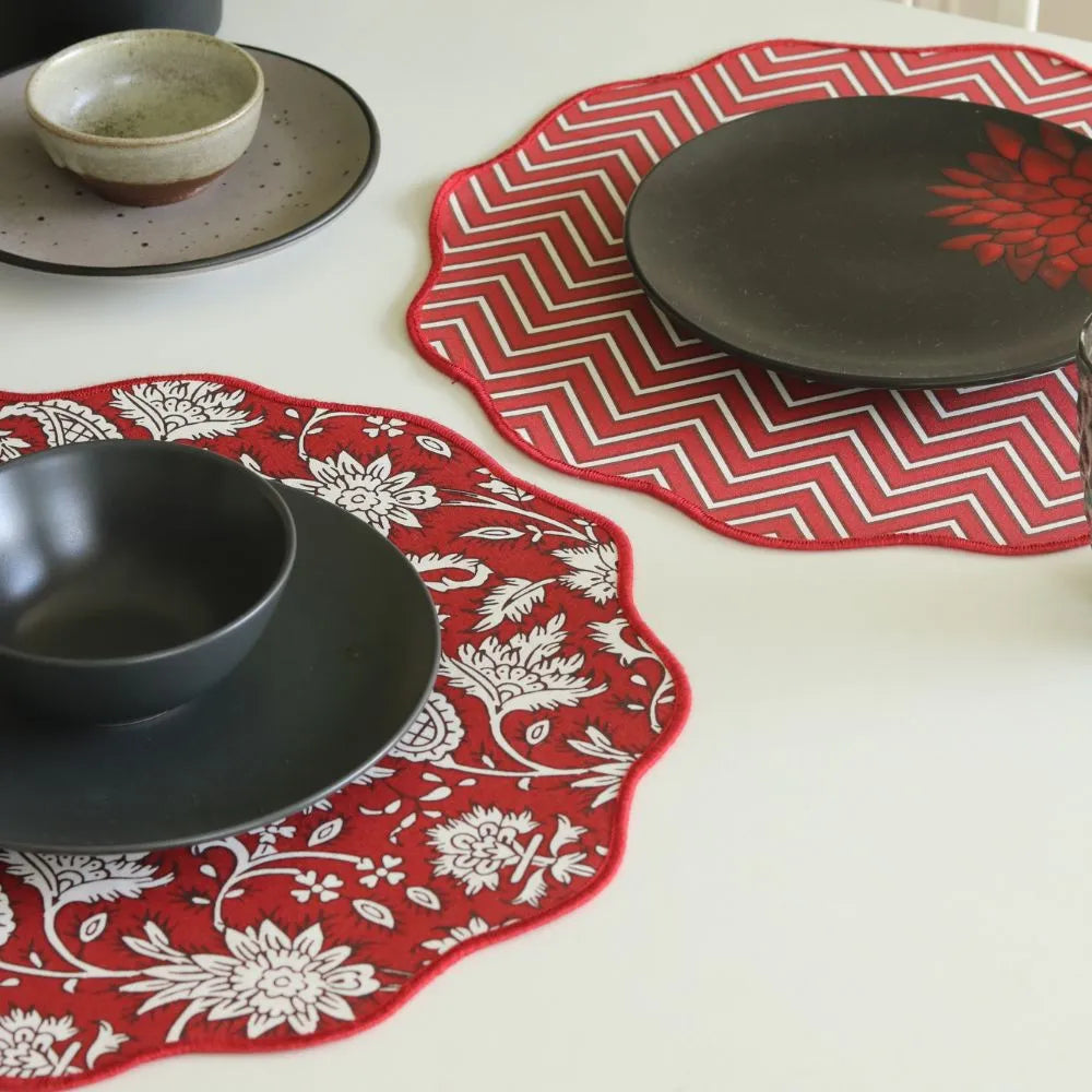 All Over Red Placemats by The Yard House, set of 4 rectangular (12" x 17"), featuring bold floral designs in vibrant red.
