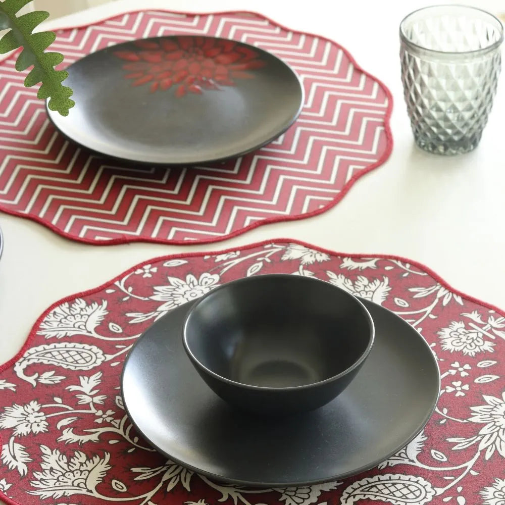 All Over Red Placemats by The Yard House, set of 4 rectangular (12" x 17"), featuring bold floral designs in vibrant red.