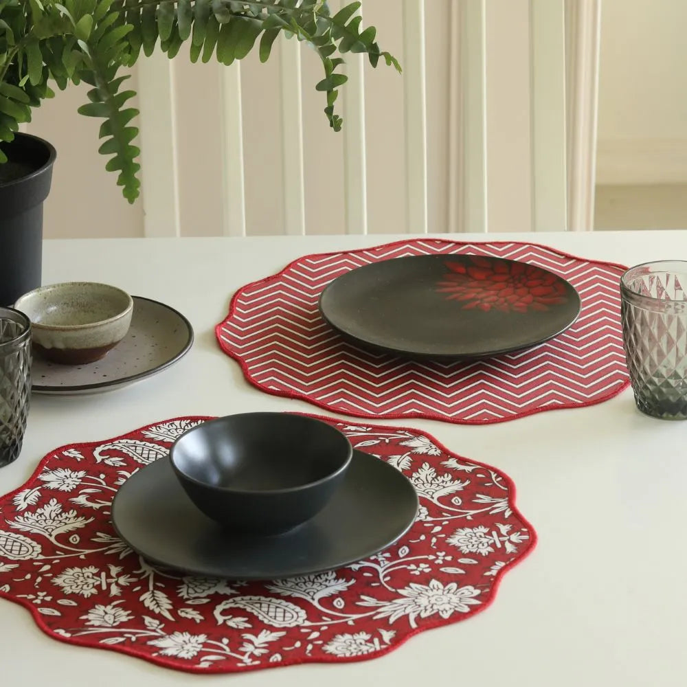 All Over Red Placemats by The Yard House, set of 4 rectangular (12" x 17"), featuring bold floral designs in vibrant red.