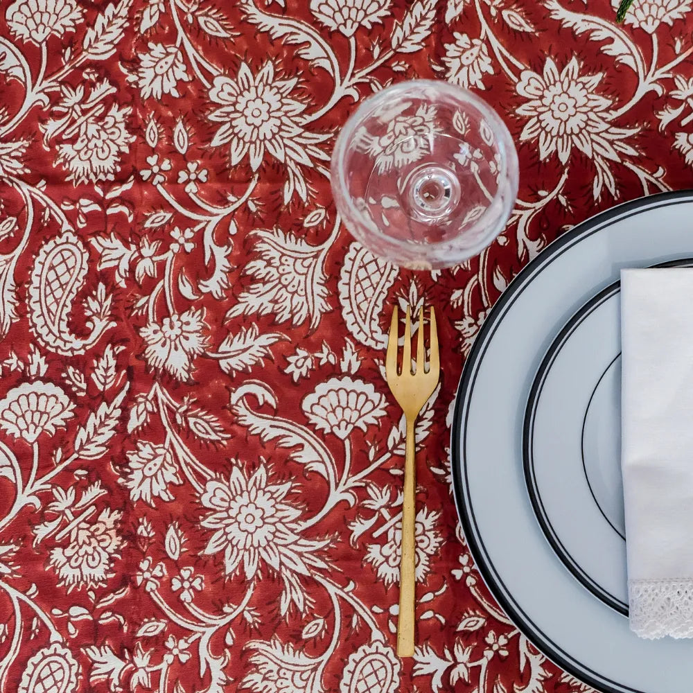 All Over Red Tablecloth by The Yard House, bold red color, available in rectangle (48”x72”), square (60”x60”), and round (...