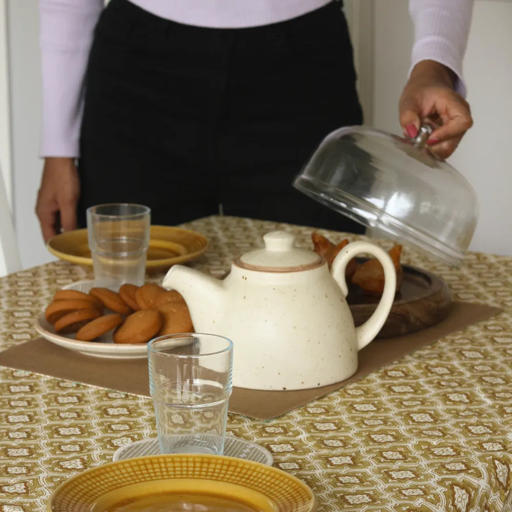 Chai & Toast Tablecloth by The Yard House in beige and brown, featuring geometric patterns, available in 4-seater round, s...