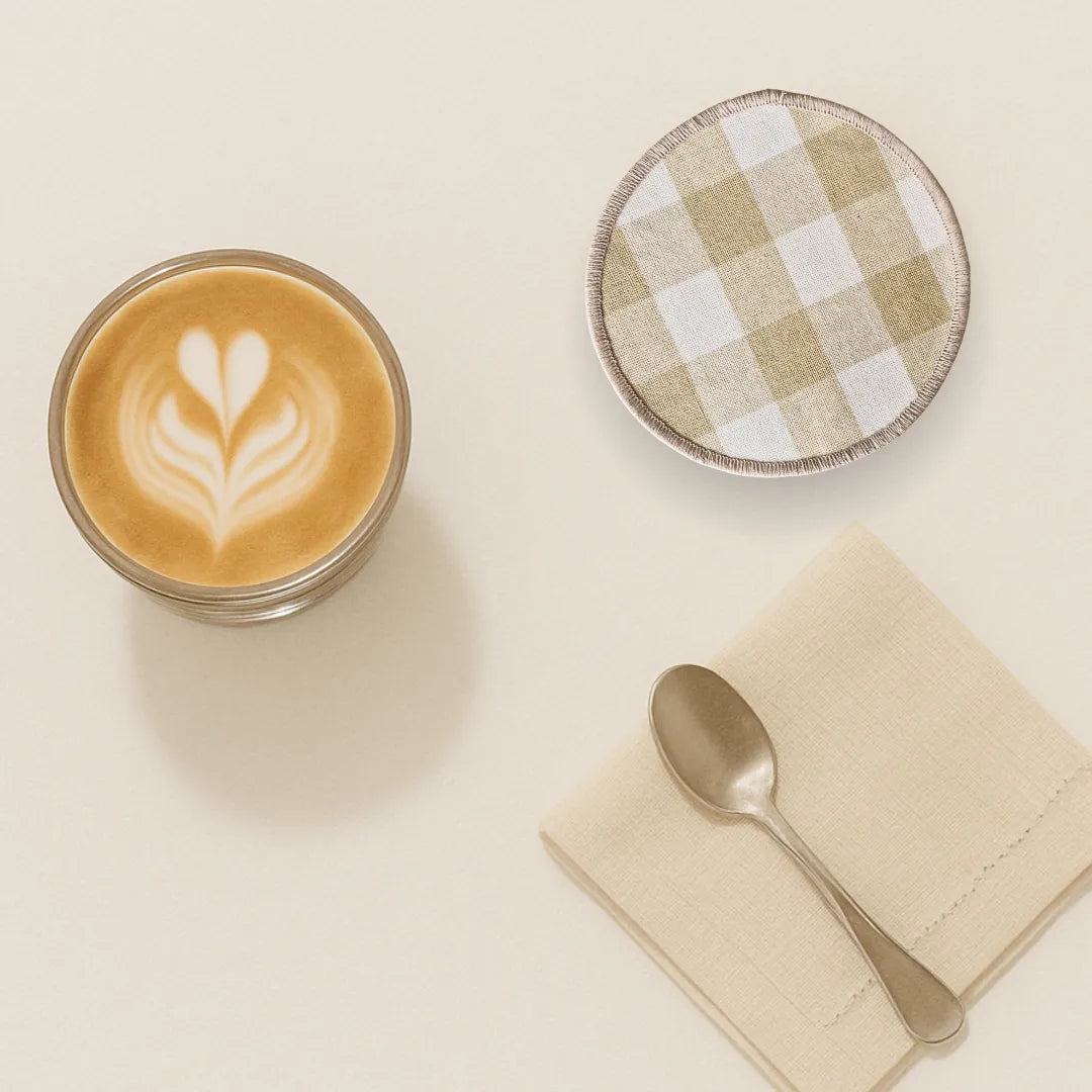 Beige checks cotton coasters by The Yard House, available in sets of 4 or 6, perfect kitchen essentials for stylish dining.