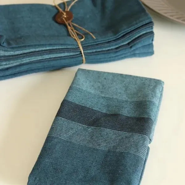Aegean Blue cotton table napkins from The Yard House, set of 4, featuring bold colors and geometric patterns from the Bhuj...