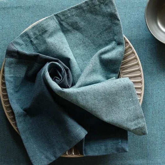 Aegean Blue cotton table napkins by The Yard House, set of 4, featuring bold colors and geometric patterns from the Bhujod...