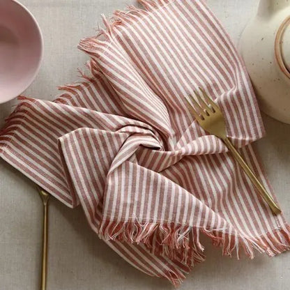 Dusty Rose Cotton Table Napkins by The Yard House, set of 4, featuring floral designs and nature-inspired prints.