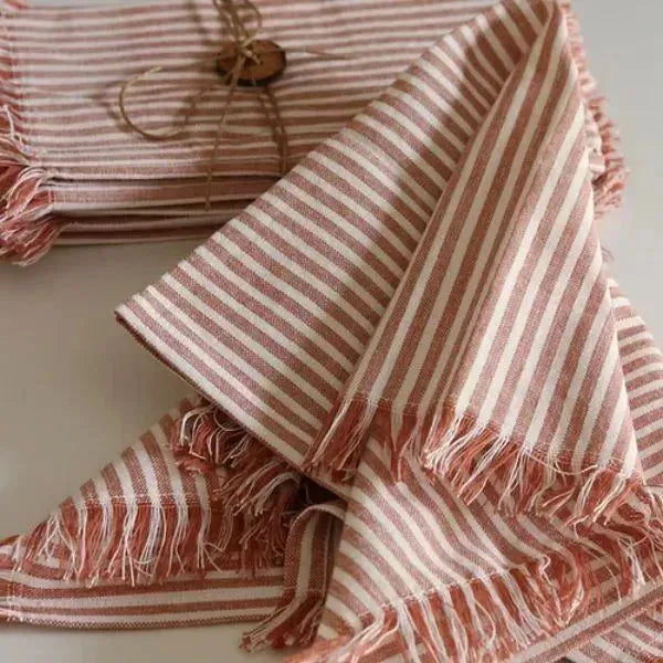 Dusty Rose Cotton Table Napkins by The Yard House, set of 4, featuring floral designs and nature-inspired prints.