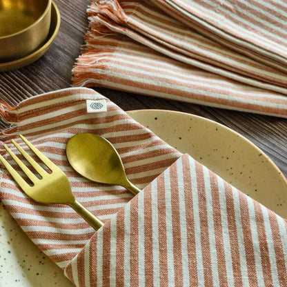 Dusty Rose Cotton Table Napkins by The Yard House, set of 4, featuring floral designs and nature-inspired prints.