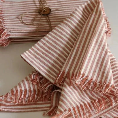 Dusty Rose Cotton Table Napkins by The Yard House, set of 4, featuring floral designs and nature-inspired prints.
