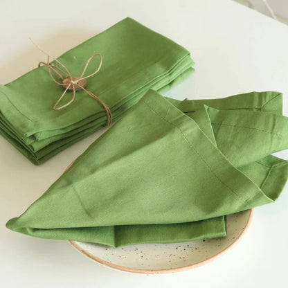 Leaf Green Solid Cotton Table Napkins by The Yard House, available in sets of 4 or 6, perfect kitchen essentials for dining.