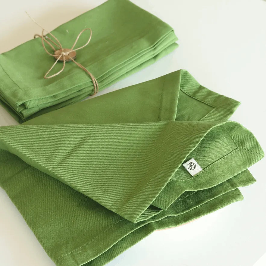 Leaf Green Solid Cotton Table Napkins by The Yard House, available in sets of 4 or 6, perfect kitchen essentials for dining.