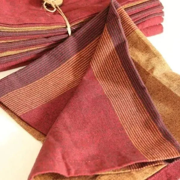 Cotton table napkins in Serene Sunset by The Yard House, featuring bold colors and geometric patterns, available in sets o...