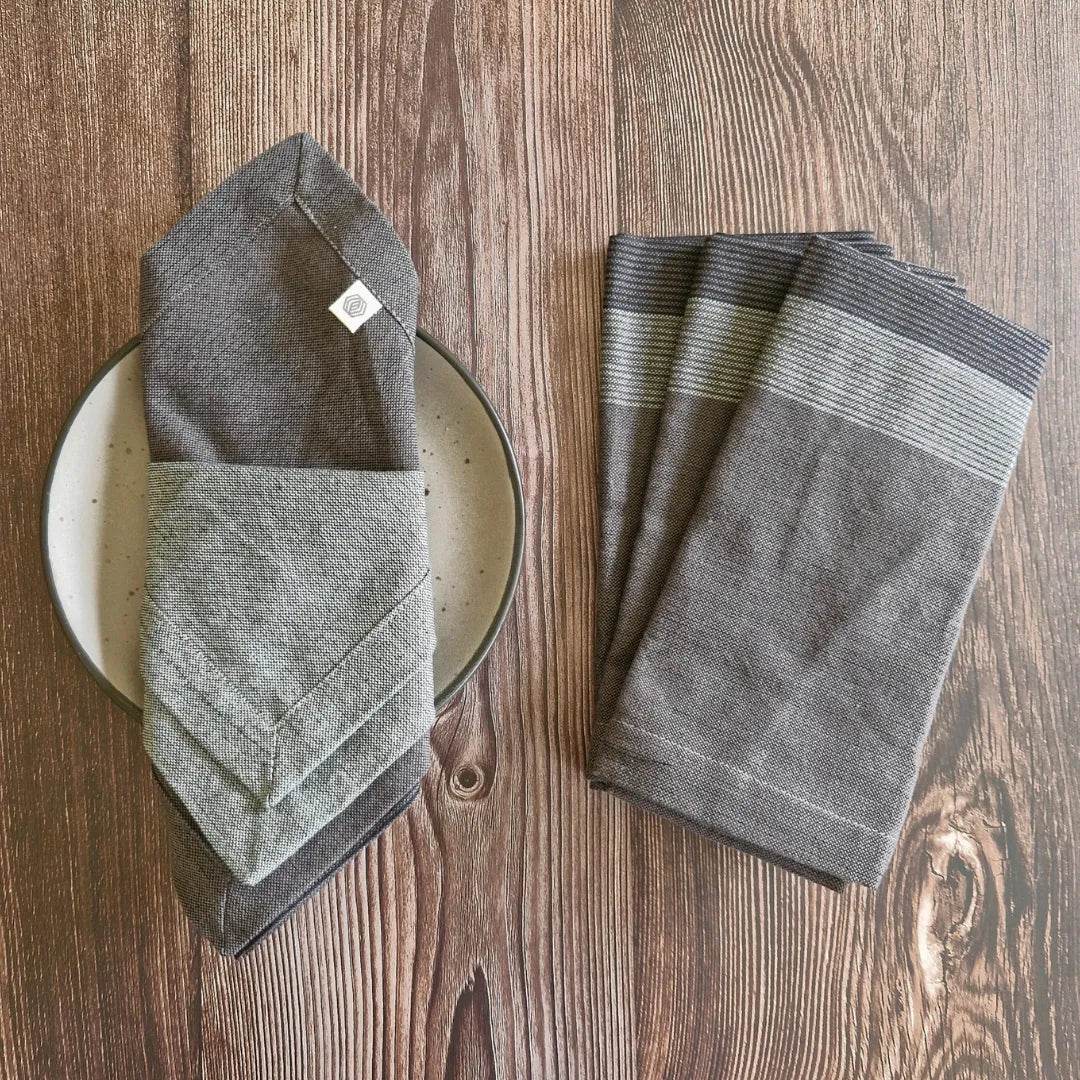 Set of 4 Winter Grey cotton table napkins by The Yard House, perfect kitchen essentials for stylish dining.