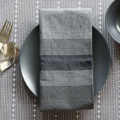 Set of 4 Winter Grey Cotton Table Napkins by The Yard House, perfect for elevating your dining aesthetic with kitchen esse...
