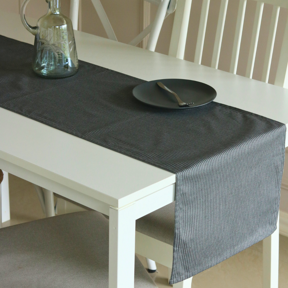 Dark Slate Runner by The Yard House in dark grey, 80"x14", featuring geometric patterns, perfect for minimalist table sett...