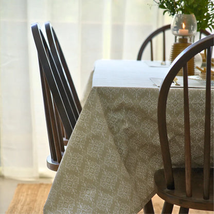 Dholpur Beige Tablecloth by The Yard House, featuring geometric patterns in neutral tones, available in square, round, and...