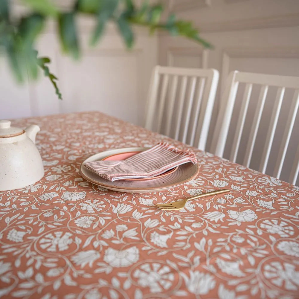 Dusty Rose Tablecloth by The Yard House, 60”x60” square size, featuring floral designs in a monochrome palette.