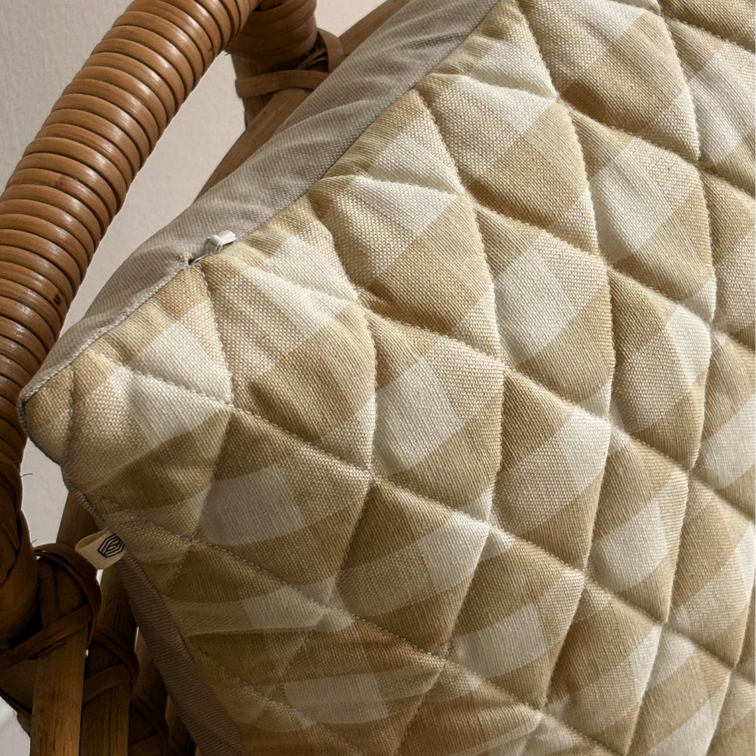 Beige checks cushion cover by The Yard House, available in square sizes 16"x16" and 18"x18", perfect for outdoor decor.