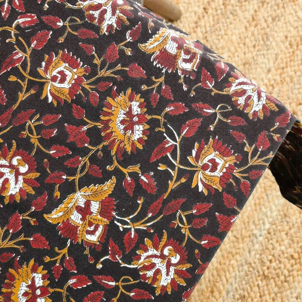 Forgotten Forest Tablecloth by The Yard House in black, 4-seater rectangle (48”x72”), featuring minimalist geometric patte...