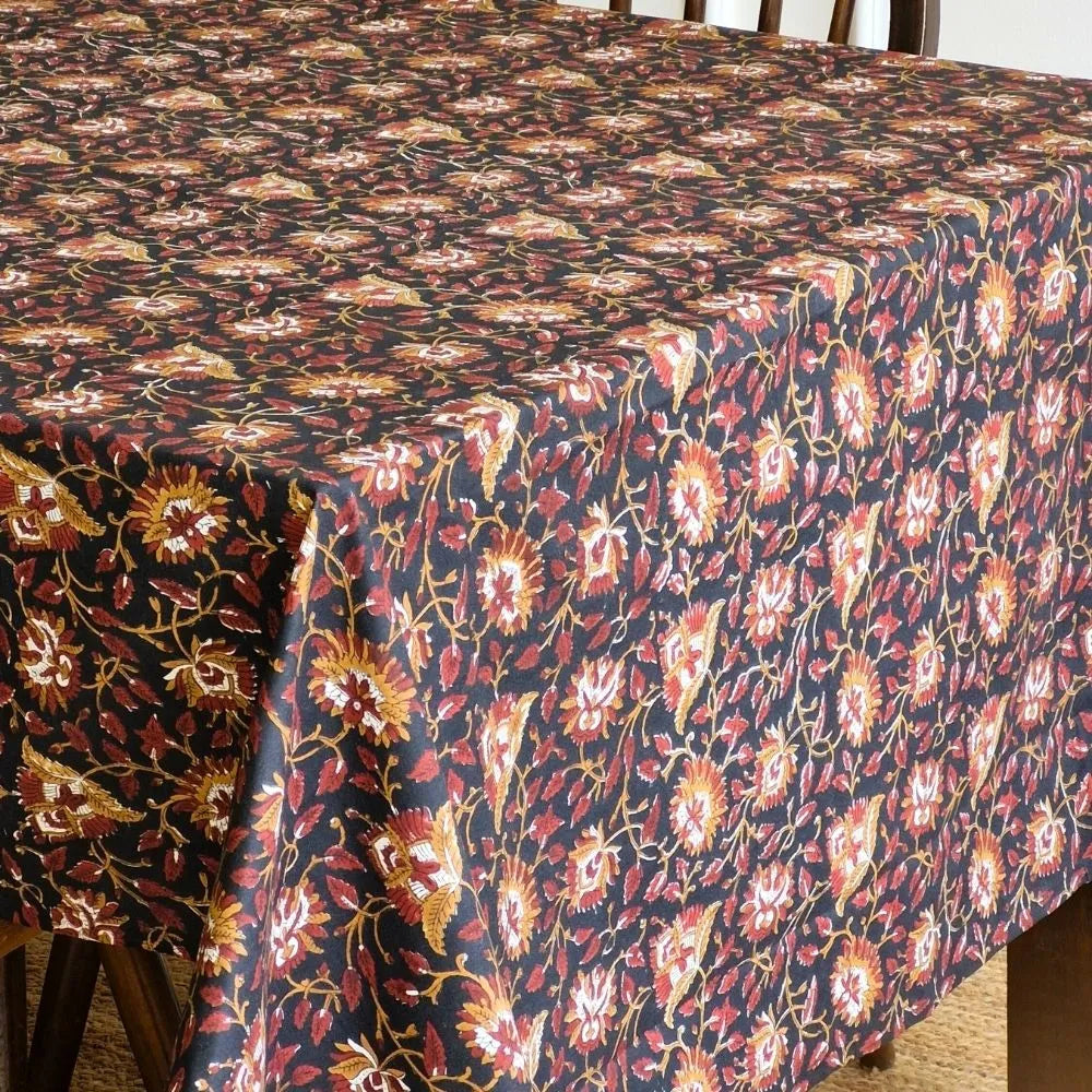 Forgotten Forest Tablecloth by The Yard House in black, 4-seater rectangle (48”x72”), featuring minimalist geometric patte...
