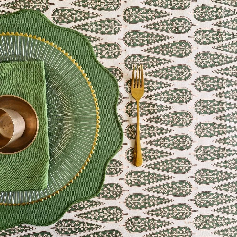Frosted Cypress Tablecloth by The Yard House in green, 60” round, featuring minimalist geometric patterns in pastel tones.