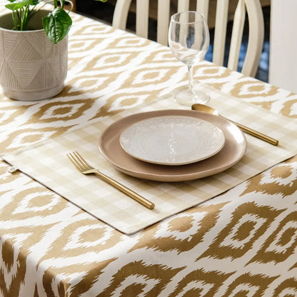 Ikat Inspired Beige Tablecloth by The Yard House, featuring abstract geometric patterns, available in 60” round or square ...