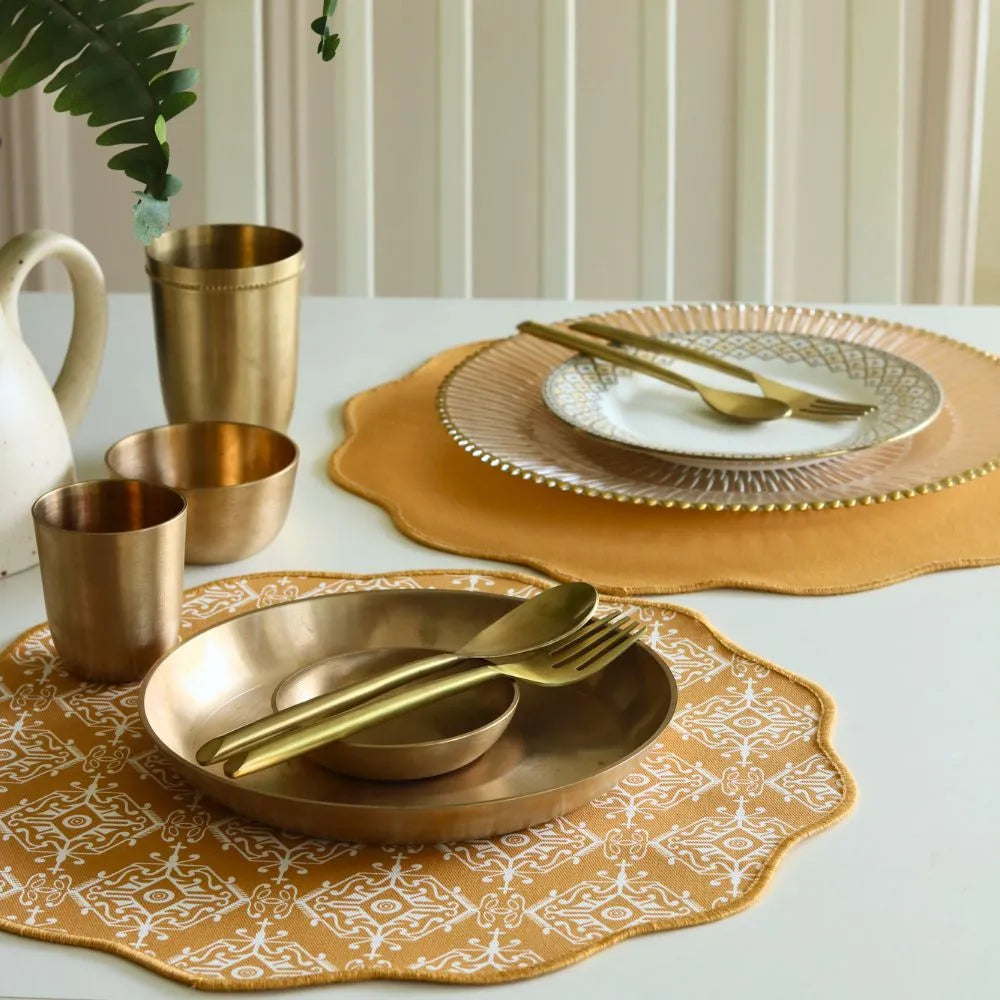 Jaisalmer Placemats by The Yard House in ochre, featuring bold geometric patterns, available in rectangular and scalloped ...