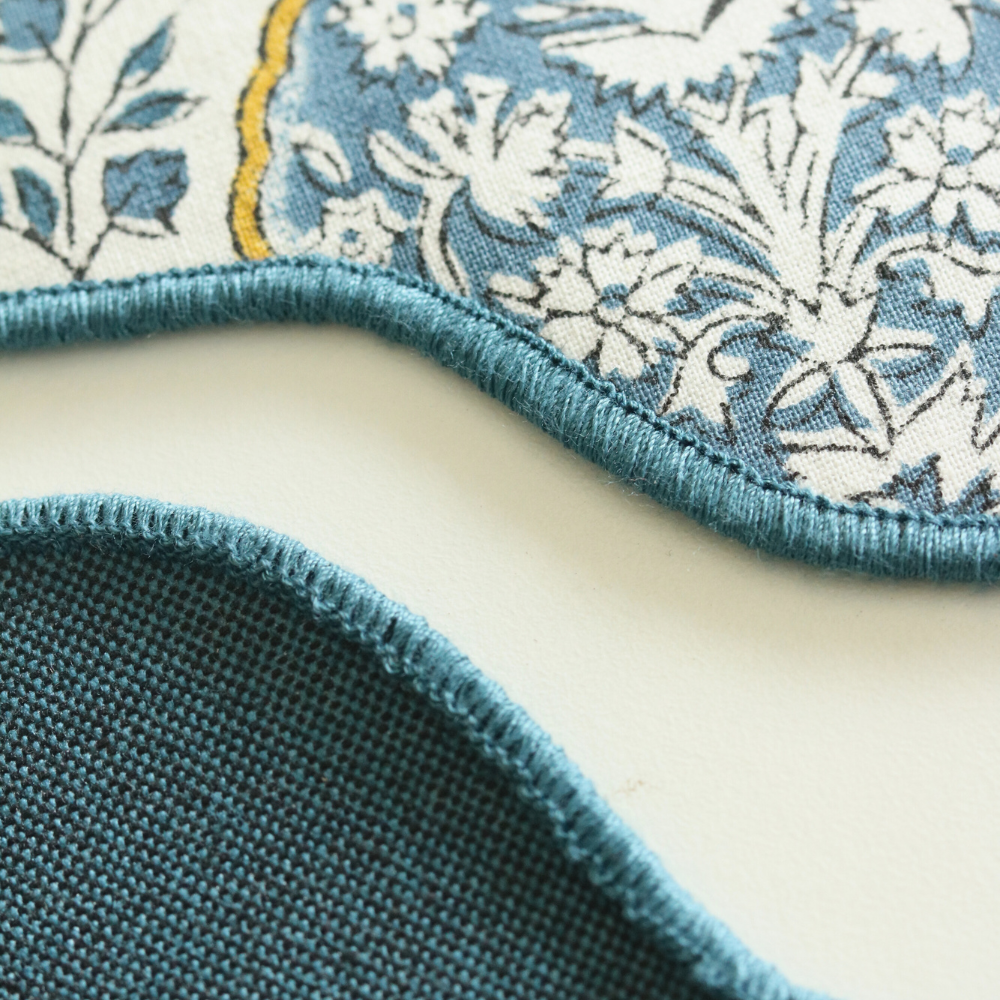 Morning Dew & Woven Aegean Blue Placemats by The Yard House, set of 4, 12" x 17", featuring geometric patterns in blue grey.