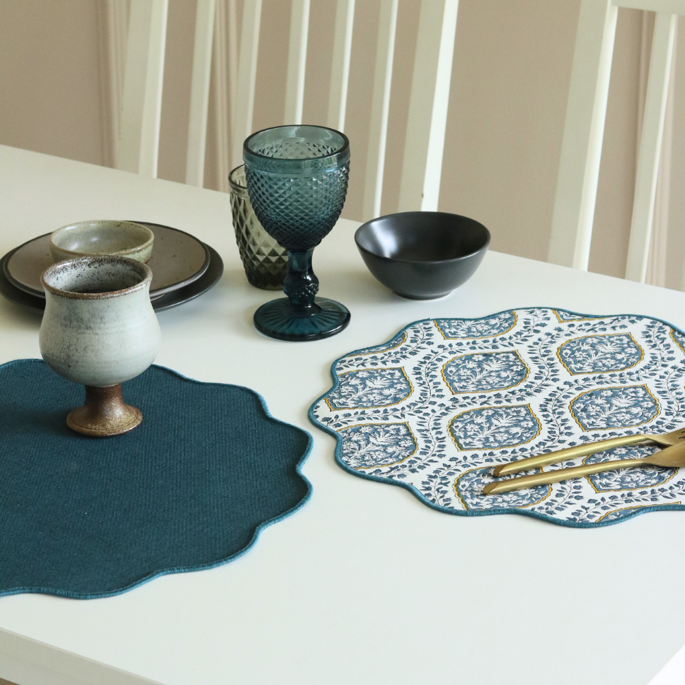 Morning Dew & Woven Aegean Blue Placemats by The Yard House, set of 4, 12" x 17", featuring geometric patterns in blue grey.