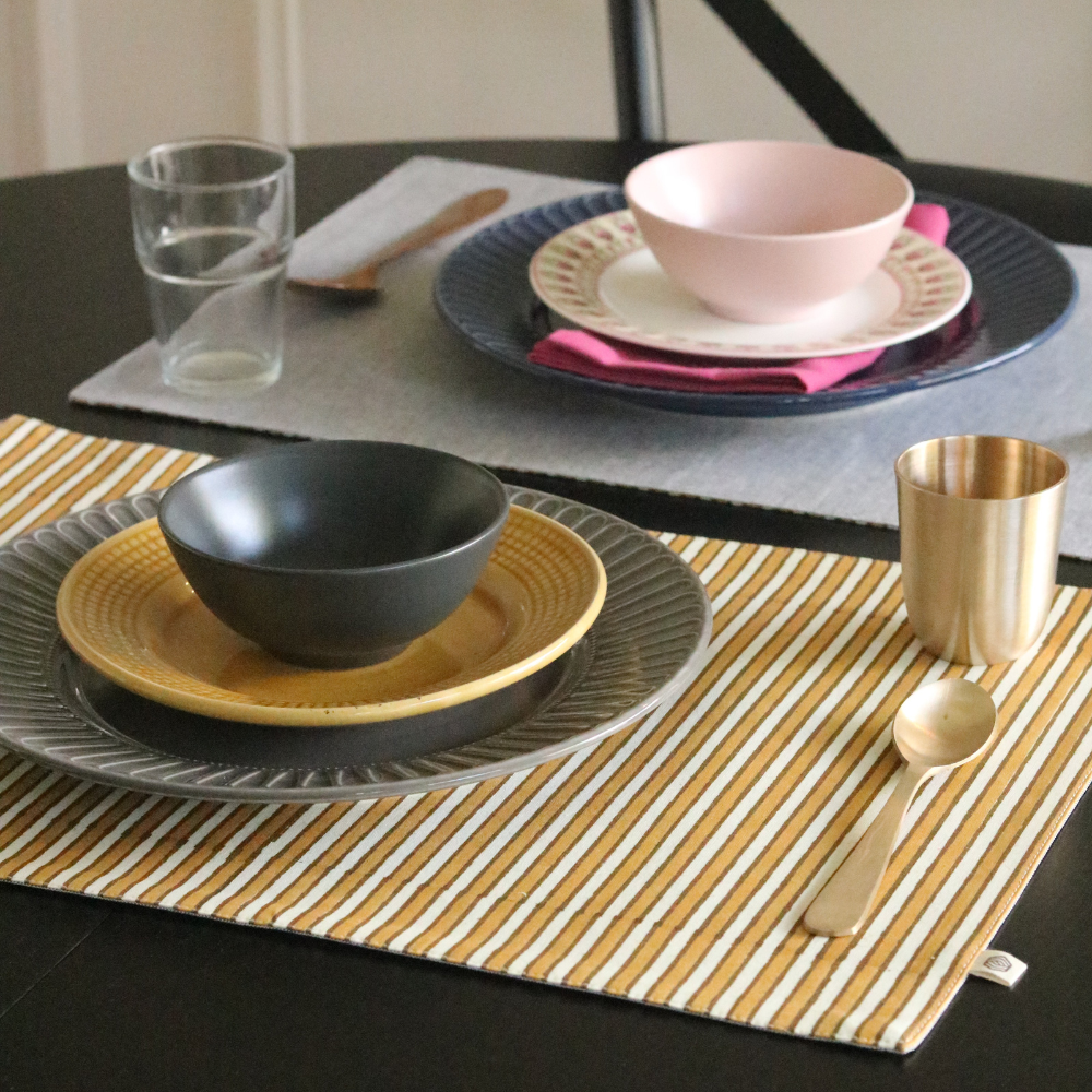 Ochre Mirage & Grey Chambray Placemats by The Yard House, set of 4, rectangular 12" x 17", featuring floral designs and sc...