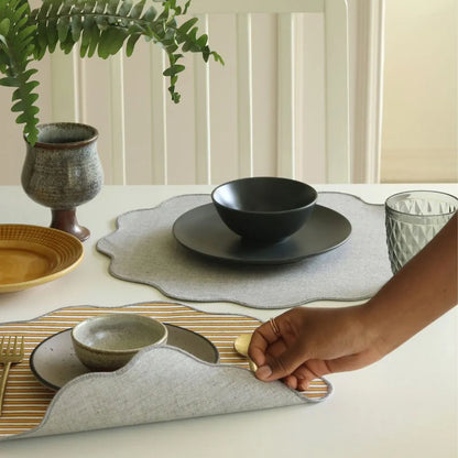 Ochre Mirage & Grey Chambray Placemats by The Yard House, set of 4 rectangle (12" x 17"), featuring floral designs in neut...