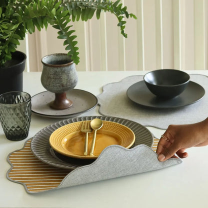 Ochre Mirage & Grey Chambray Placemats by The Yard House, set of 4 rectangle (12" x 17"), featuring floral designs in neut...