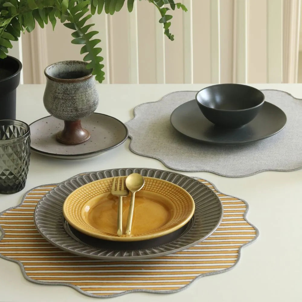 Ochre Mirage & Grey Chambray Placemats by The Yard House, set of 4 rectangle (12" x 17"), featuring floral designs in neut...