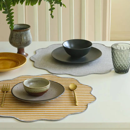 Ochre Mirage & Grey Chambray Placemats by The Yard House, set of 4 rectangle (12" x 17"), featuring floral designs in neut...