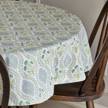 Riverside Tablecloth by The Yard House in blue-green, 60” round, featuring elegant block-printed geometric patterns.
