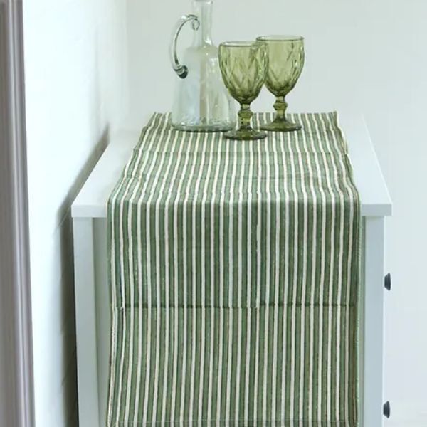 Sage Mirage Runner by The Yard House in green, 60"x14", perfect for festive dining with wipeable and anti-slip features.