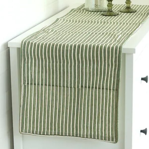 Sage Mirage Runner by The Yard House in green, 60"x14", perfect for festive dining with wipeable and anti-slip features.