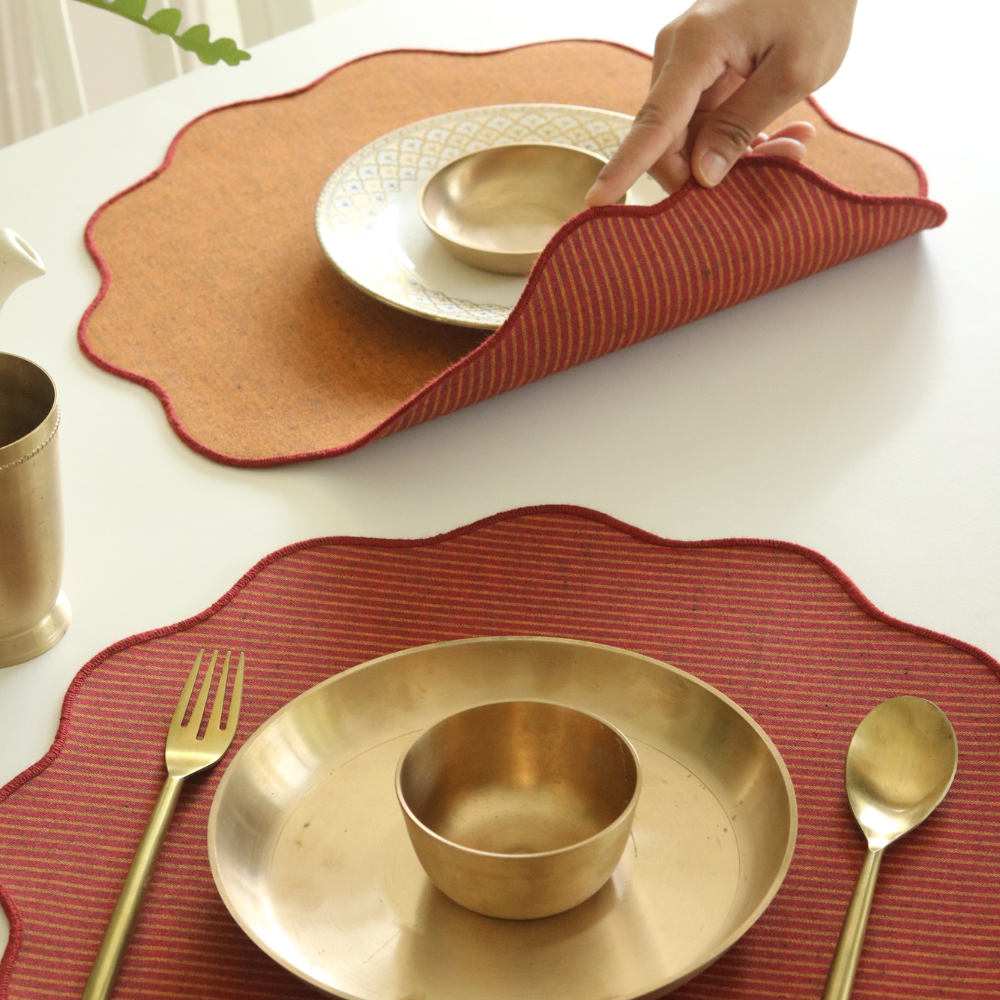Serene Sunset Placemats by The Yard House in vibrant orange, set of 4, featuring geometric patterns and scalloped edges, p...