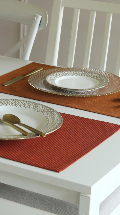 Serene Sunset Placemats by The Yard House in vibrant orange, set of 4 rectangular (12" x 17"), featuring bold colors and g...