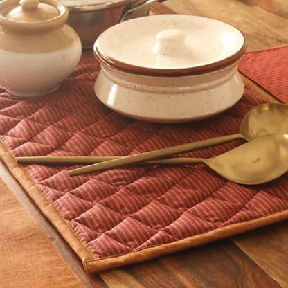 Serene Sunset Tablepad by The Yard House in red, 15x15 inches, featuring a quilted, wipeable design with bold geometric pa...