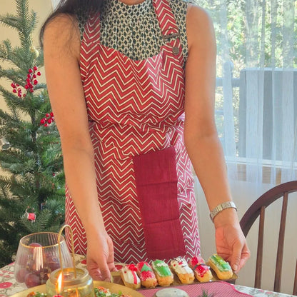 Spill-resistant, all-over red cotton apron with three pockets by The Yard House, perfect for kitchen essentials and new ar...