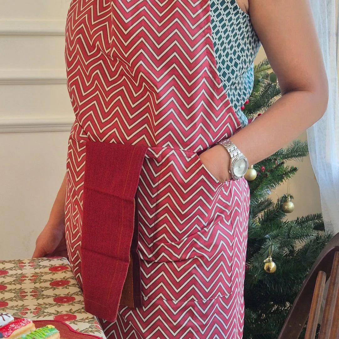 Spill-resistant, all-over red cotton apron with three pockets by The Yard House, perfect for kitchen essentials and new ar...